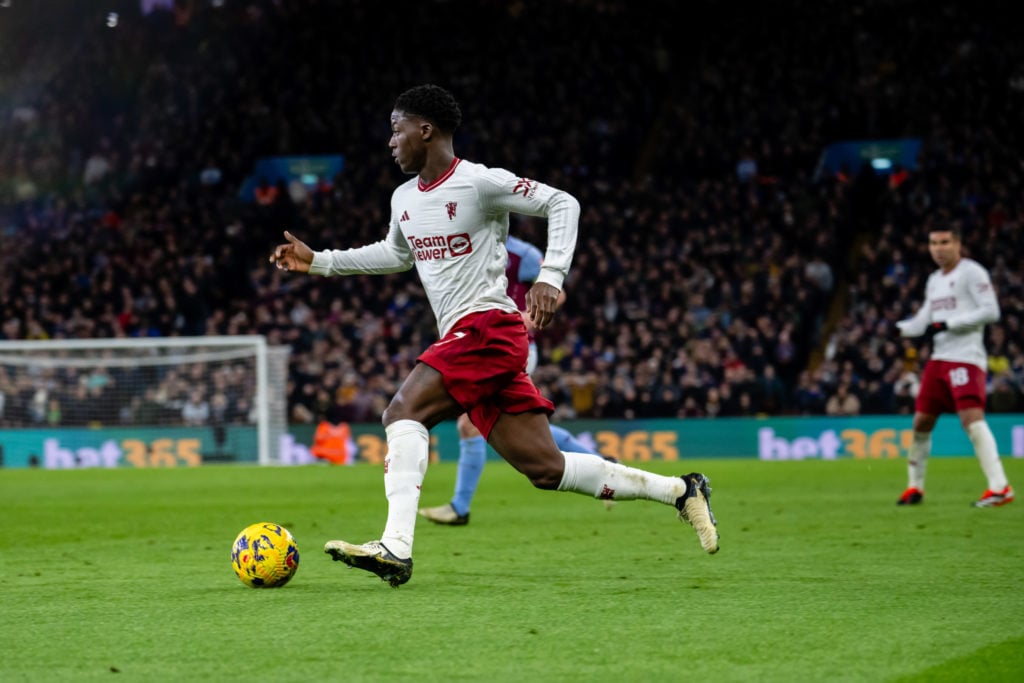 Kobbie Mainoo of Manchester United in action during the Premier League match between Aston Villa and Manchester United at Villa Park on February 11...