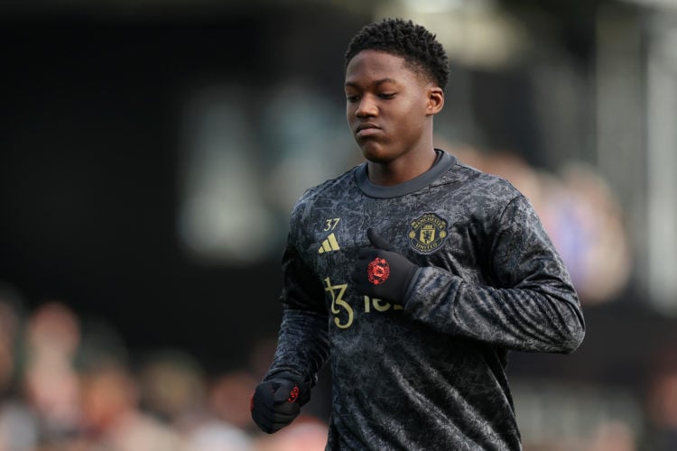 Kobbie Mainoo of Manchester United warms up prior to the Premier League match between Luton Town and Manchester United at Kenilworth Road on Februa...