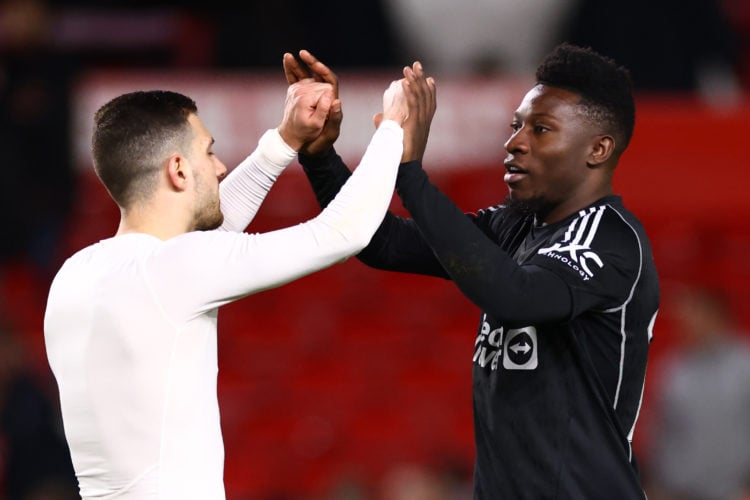 Andre Onana of Manchester United celebrates with Diogo Dalot after the Emirates FA Cup Fifth Round match between Nottingham Forest and Manchester U...