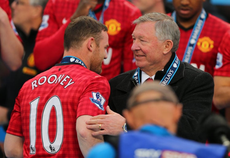 Wayne Rooney of Manchester United with Sir Alex Ferguson the head coach / manager of Manchester United