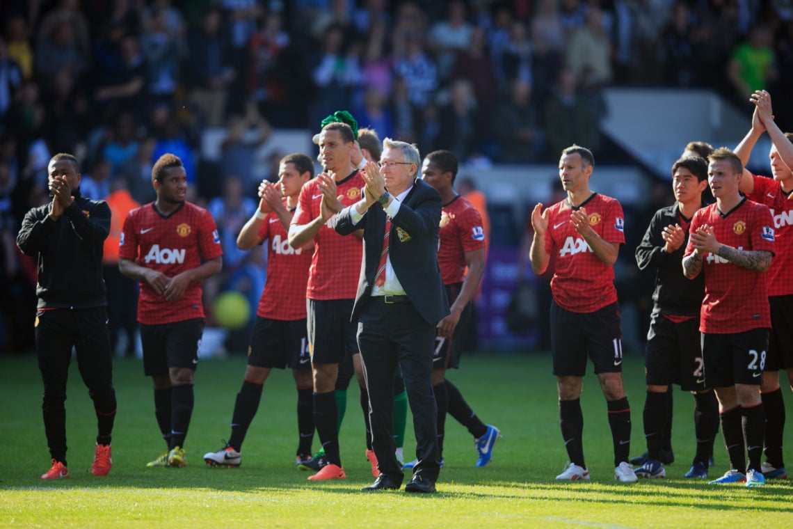 Sir Alex Ferguson the head coach / manager of Manchester United applauds the fans before saying goodbye after his last game