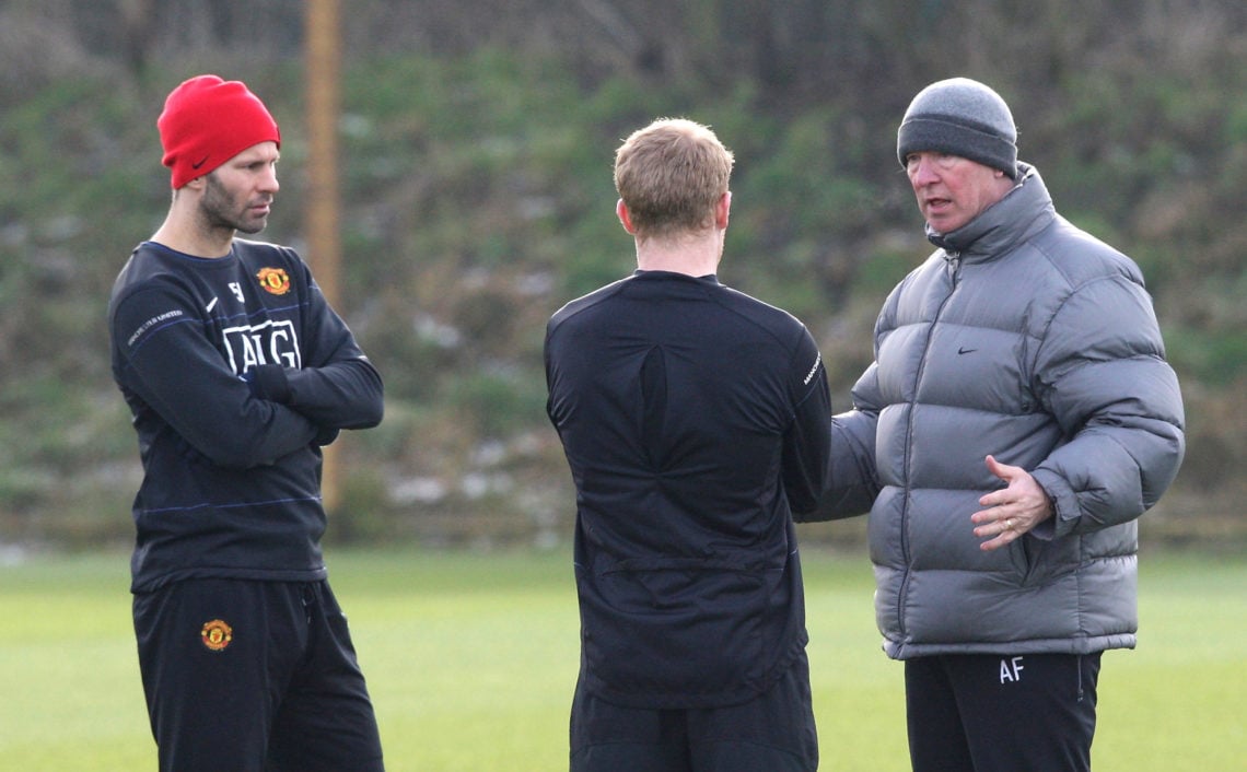 Sir Alex Ferguson (R) of Manchester United speaks to Ryan Giggs (L) and Paul Scholes (C) during a first team Training Session at Carrington Trainin...