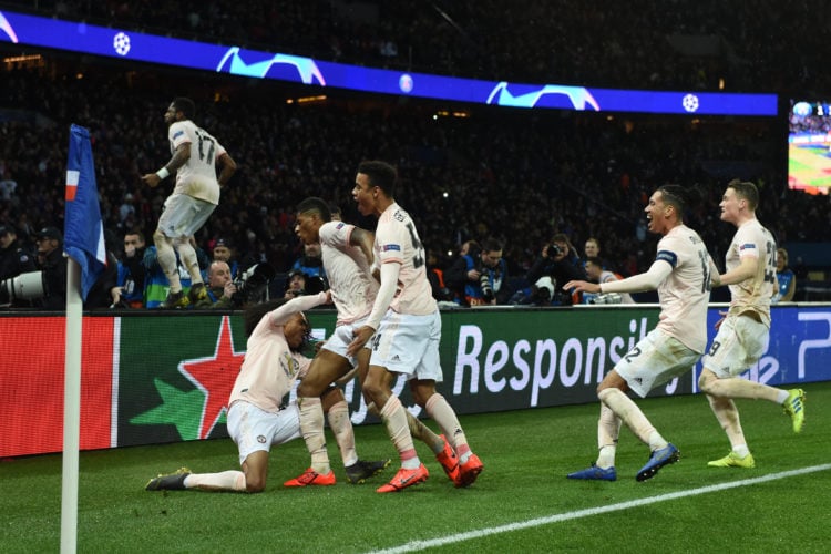 Marcus Rashford of Manchester United celebrates scoring his side's third goal during the UEFA Champions League Round of 16 Second Leg match between...