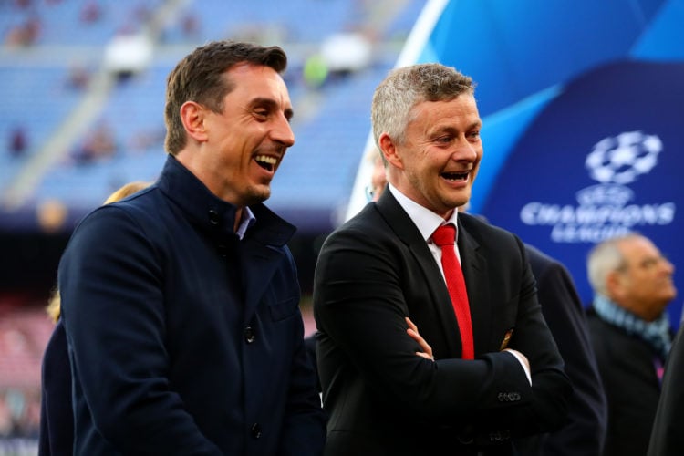 Manager of Manchester United Ole Gunnar Solskjaer shares a joke with Gary Neville before the UEFA Champions League Quarter Final second leg match b...