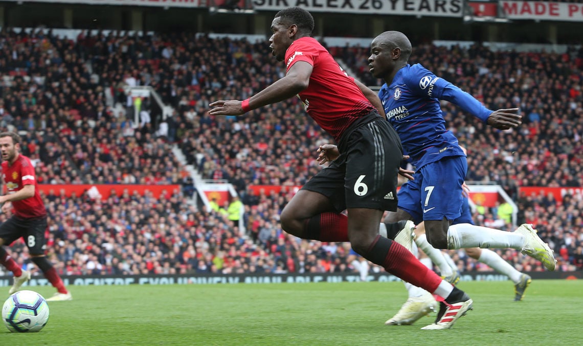 Paul Pogba of Manchester United in action with Ngolo Kante of Chelsea during the Premier League match between Manchester United and Chelsea FC at O...