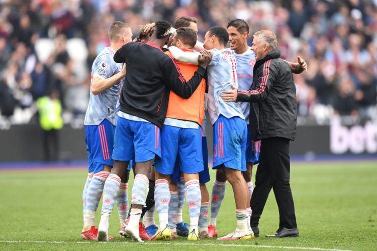 Ole Gunnar Solskjaer, Manager of Manchester United and Players of Manchester United embrace teammate David De Gea after saving the penalty taken by...