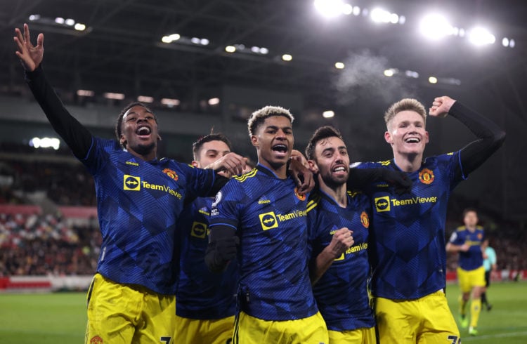 Marcus Rashford of Manchester United celebrates with teammates Anthony Elanga, Bruno Fernandes and Scott McTominay after scoring their side's third...