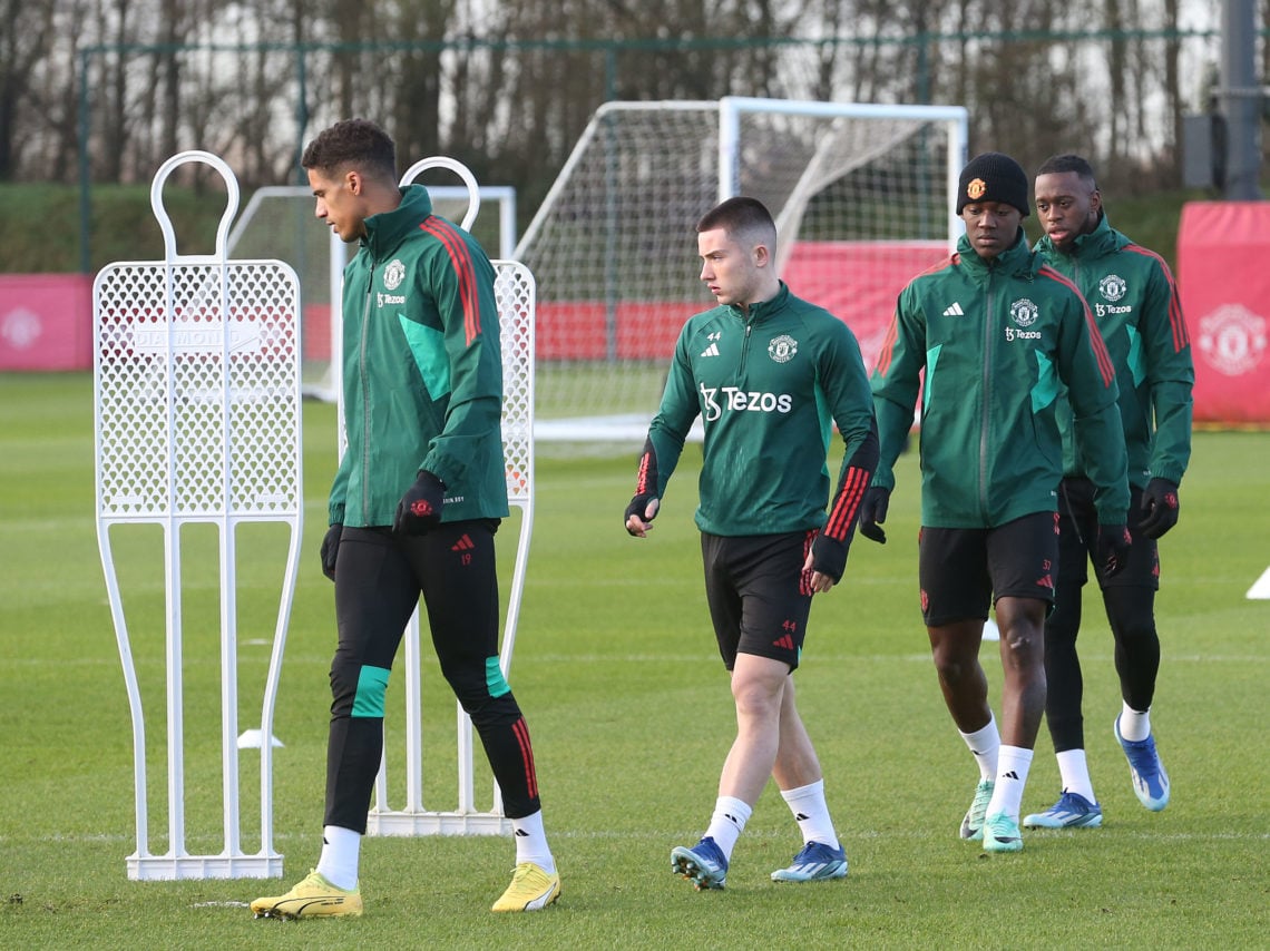 (EXCLUSIVE COVERAGE) Raphael Varane, Dan Gore, Kobbie Mainoo, Aaron Wan-Bissaka of Manchester United in action during a first team training session...