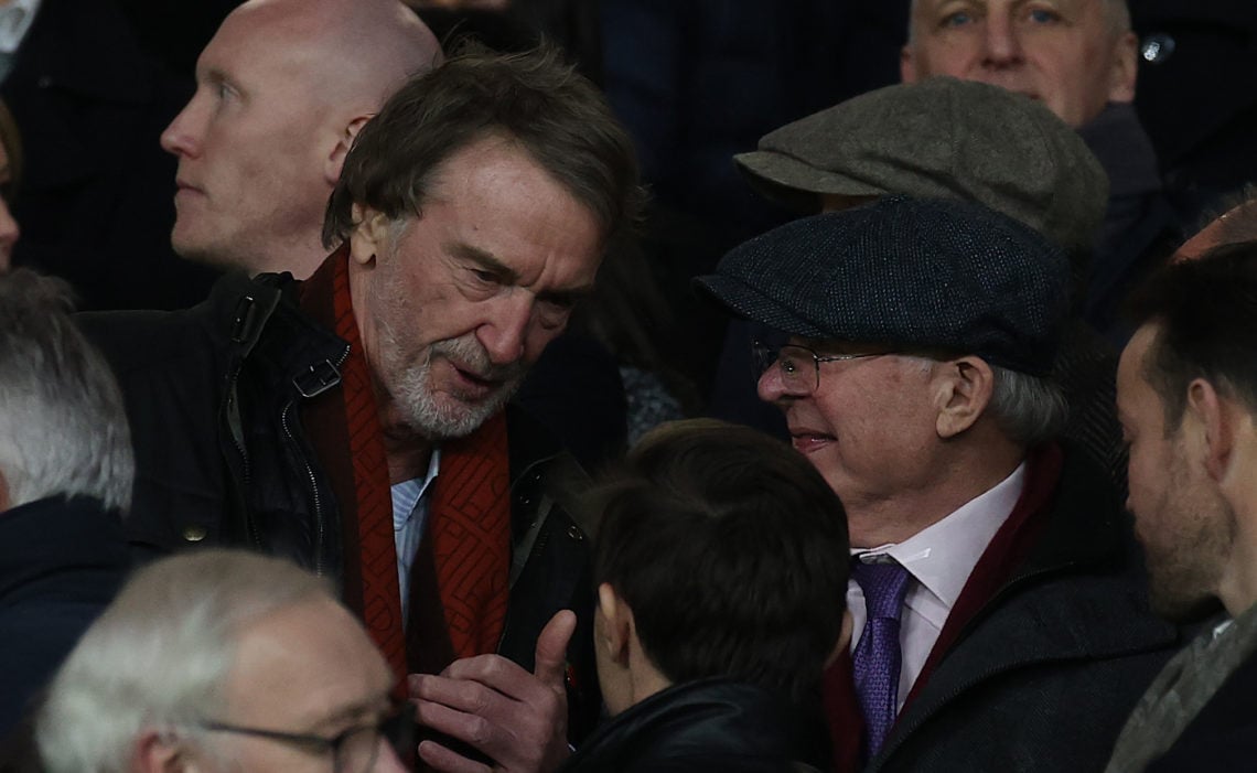 Sir Jim Ratcliffe of INEOS talks to Sir Alex Ferguson in the directors box ahead of the Premier League match between Manchester United and Tottenha...
