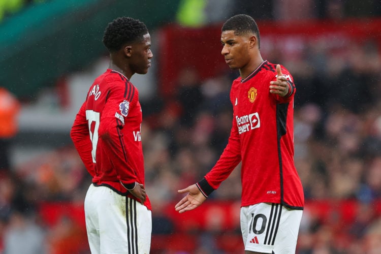 Marcus Rashford of Manchester United argues with teammate Kobbie Mainoo during the Premier League match between Manchester United and Fulham FC at ...