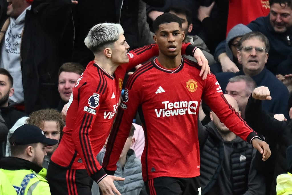 TOPSHOT - Manchester United's English striker #10 Marcus Rashford (R) celebrates with Manchester United's Argentinian midfielder #17 Alejandro Garn...