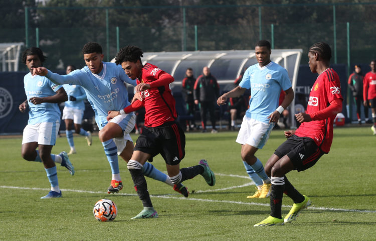 Ethan Williams of Manchester United in action during the U18 Premier League match between Manchester City U18 and Manchester United U18 at Joie Sta...