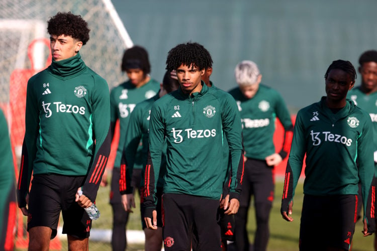 Ethan Wheatley, Ethan Williams  and Habeeb Ogunneye of Manchester United in action during a first team training session at Carrington Training Grou...