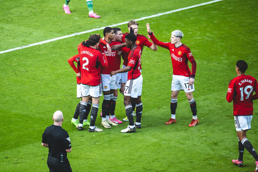 Manchester United players celebrate.