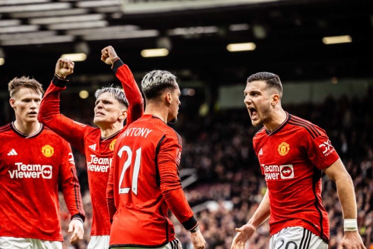 Antony of Manchester United celebrates scoring a goal to make the score 2-2 with Diogo Dalot during the Emirates FA Cup Quarter Final match between...