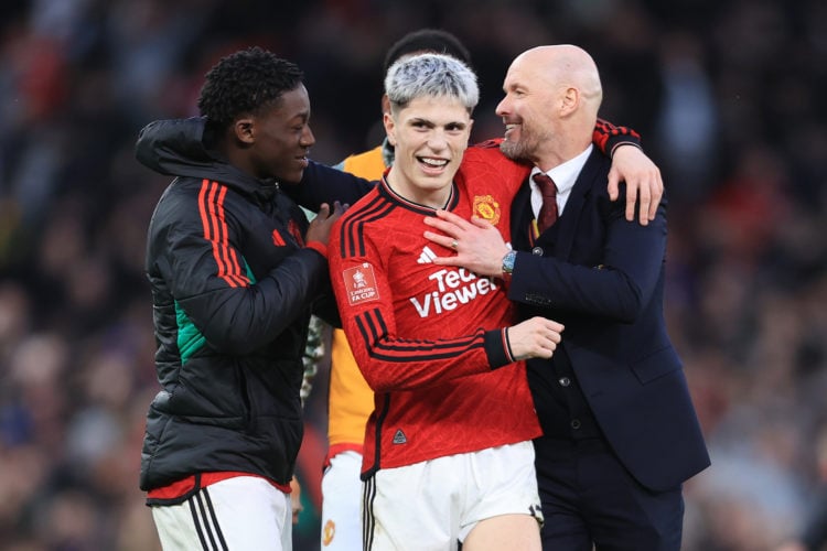 Manchester United manager Erik ten Hag celebrates with Alejandro Garnacho of Manchester United (C) and Kobbie Mainoo of Manchester United (L) after...