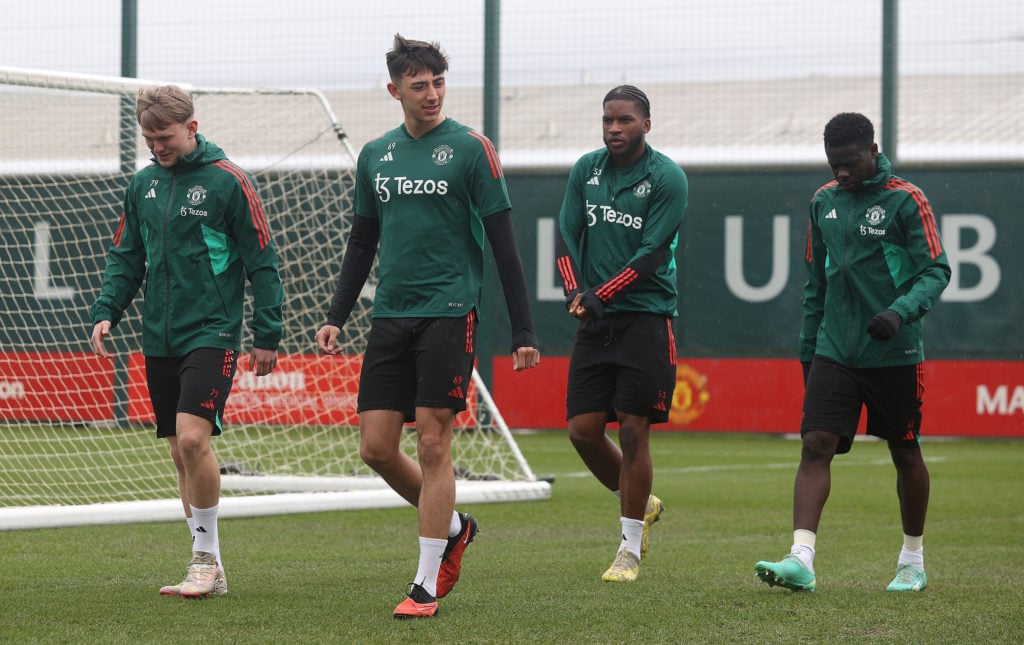 (EXCLUSIVE COVERAGE) Finlay McAllister, Sonny Aljofree, Willy Kambwala, Omari Forson of Manchester United in action during first team training sess...