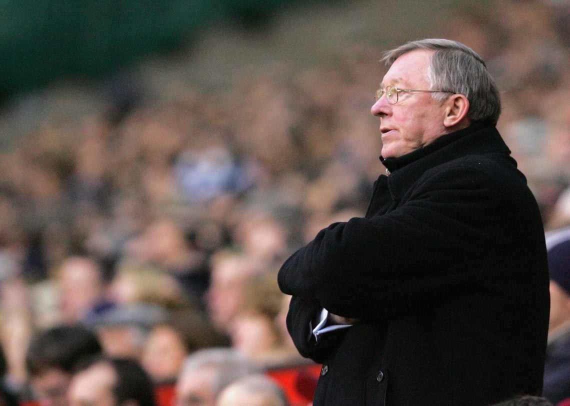 Sir Alex Ferguson of Manchester United watches from the dugout during the Barclays Premiership match between Manchester United and Reading at Old T...