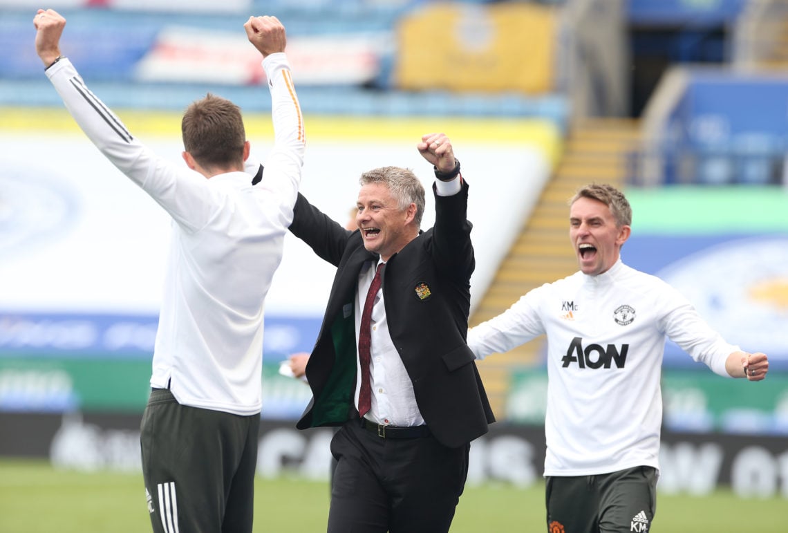 Coach Michael Carrick, Manager Ole Gunnar Solskjaer and Coach Kieran McKenna of Manchester United celebrate at the final whistle during the Premier...