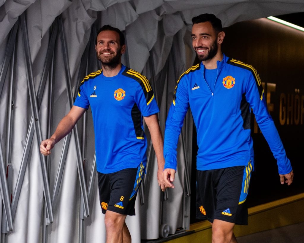 Juan Mata and Bruno Fernandes of Manchester United arrives ahead of a first team training session at Stadion Wankdorf on September 13, 2021 in Bern...