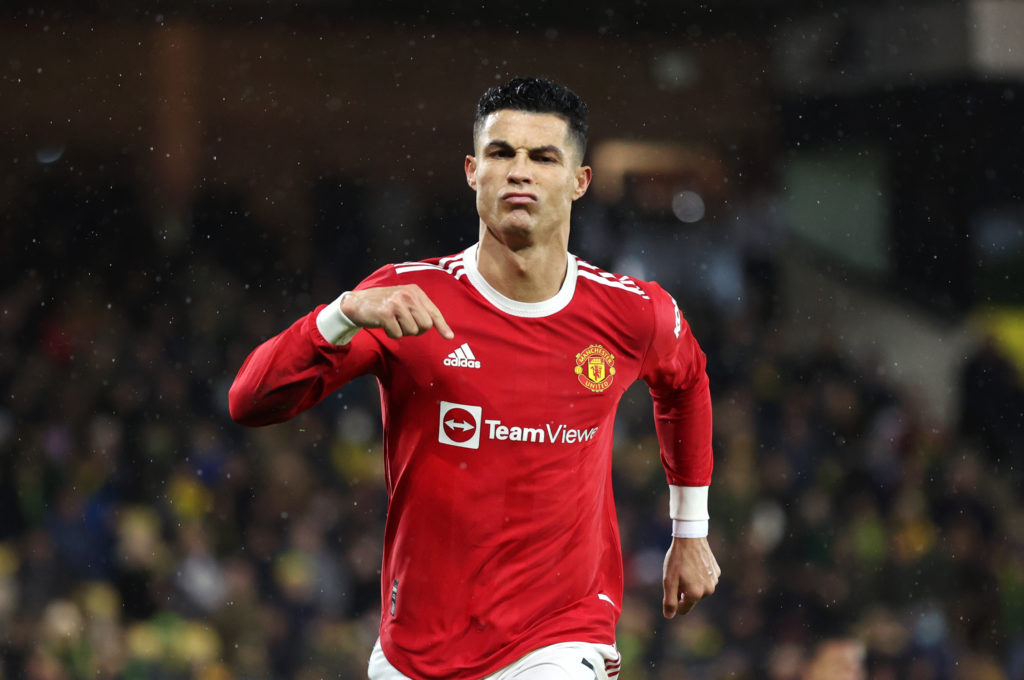 Cristiano Ronaldo of Manchester United celebrates after scoring his sides first goal from the penalty spot during the Premier League match between ...