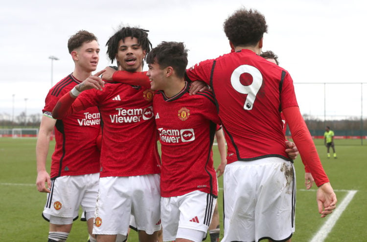 Ethan Williams of Manchester United U18s celebrates scoring their third goal during the U18 Premier League match between Manchester United U18s and...