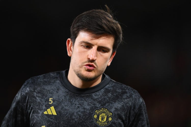 Harry Maguire of Manchester United looks on during the warm up prior to the Premier League match between Brentford FC and Manchester United at Gtec...