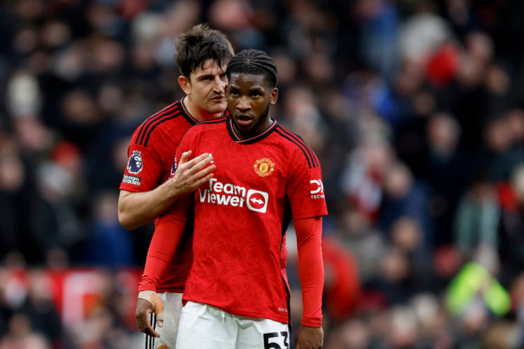 Harry Maguire and Willy Kambwala of Manchester United during the Premier League match between Manchester United and Liverpool FC at Old Trafford on...