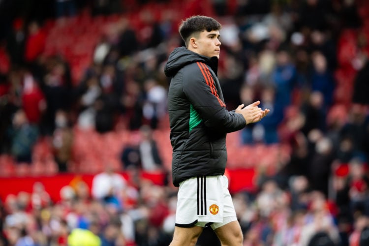 Harry Amass of Manchester United applauds the fans after the Premier League match between Manchester United and Liverpool FC at Old Trafford on Apr...