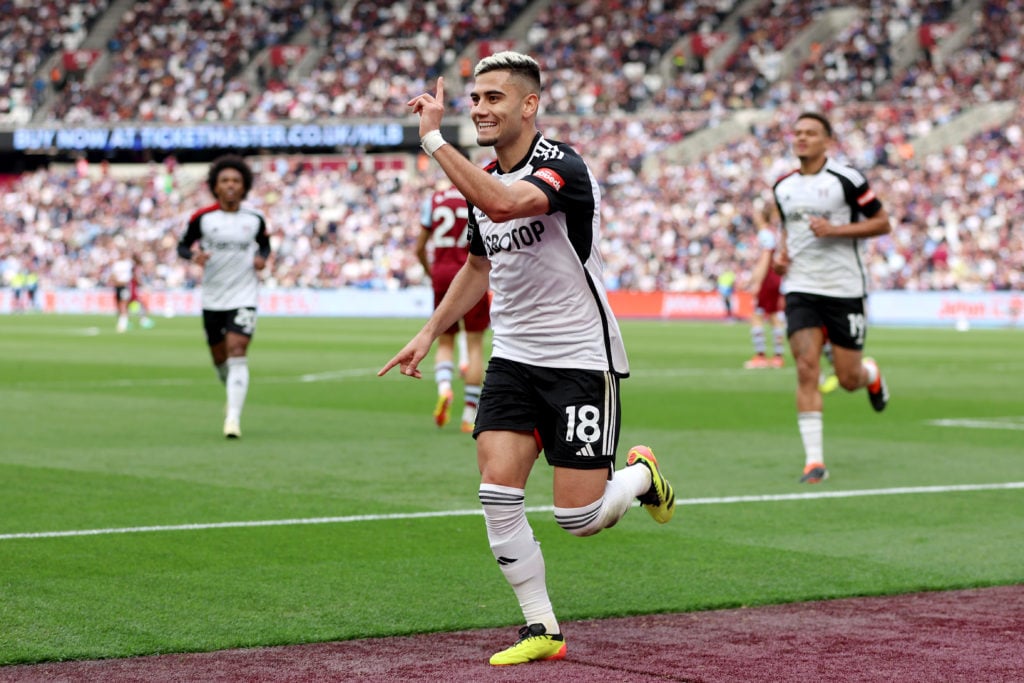 Andreas Pereira of Fulham celebrates scoring his team's second goal during the Premier League match between West Ham United and Fulham FC at London...
