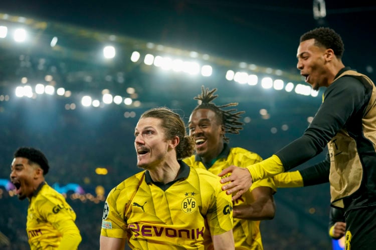 Marcel Sabitzer of Borussia Dortmund celebrates after scoring his team's fourth goal with teammates during the UEFA Champions League quarter-final ...