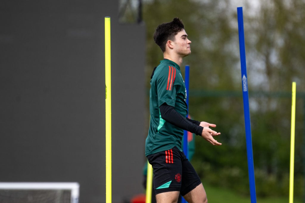 Harry Amass of Manchester United in action during a first team training session at Carrington Training Ground on April 16, 2024 in Manchester, Engl...