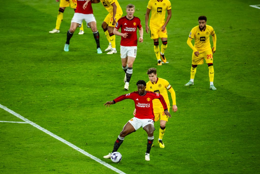 Kobbie Mainoo of Manchester United in action during the Premier League match between Manchester United and Sheffield United at Old Trafford on Apri...
