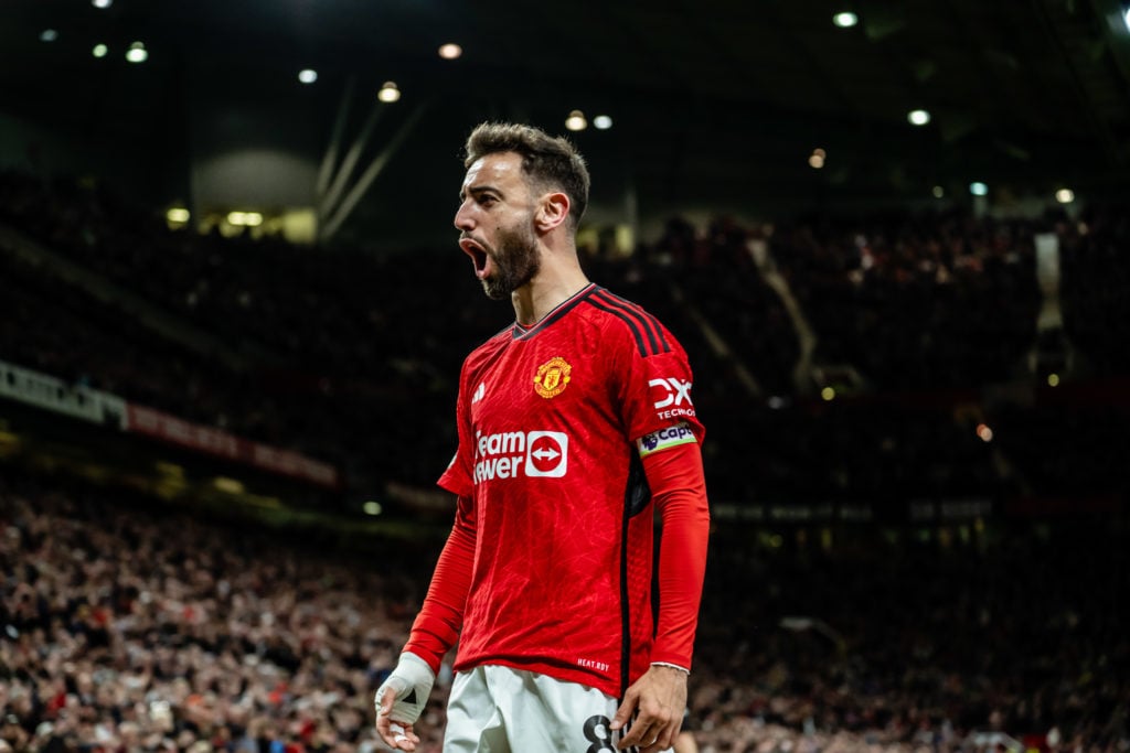 Bruno Fernandes of Manchester United celebrates scoring a goal to make the score 3-2 during the Premier League match between Manchester United and ...