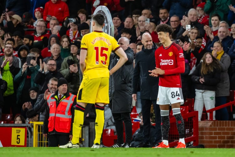 Manchester United Head Coach / Manager Erik ten Hag speaks to Ethan Wheatley of Manchester United as he makes his first team debut during the Premi...