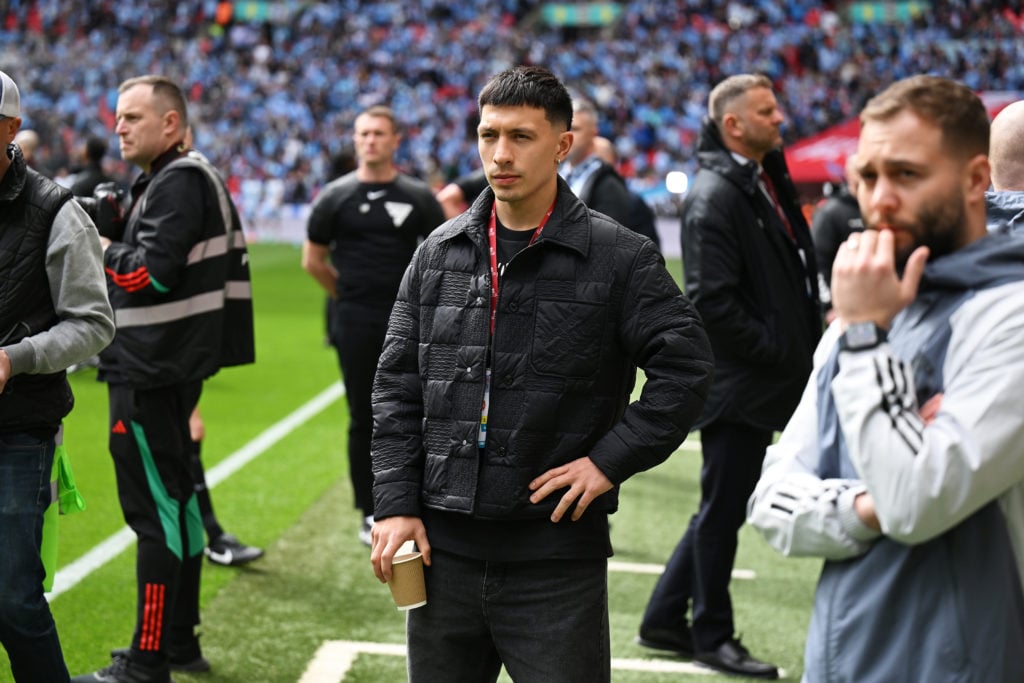 Lisandro Martinez of Manchester United looks on from the sidelines during the Emirates FA Cup Semi Final match between Coventry City and Manchester...