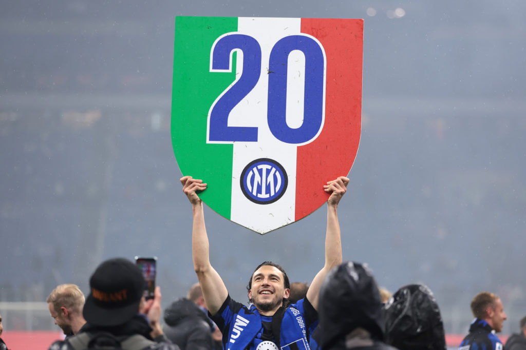 Matteo Darmian of FC Internazionale celebrates the club's 20th Scudetto following the final whistle of the Serie A TIM match between AC Milan and F...