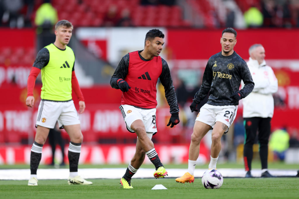 Casemiro and Antony of Manchester United battle for the ball as they warm up prior to the Premier League match between Manchester United and Sheffi...