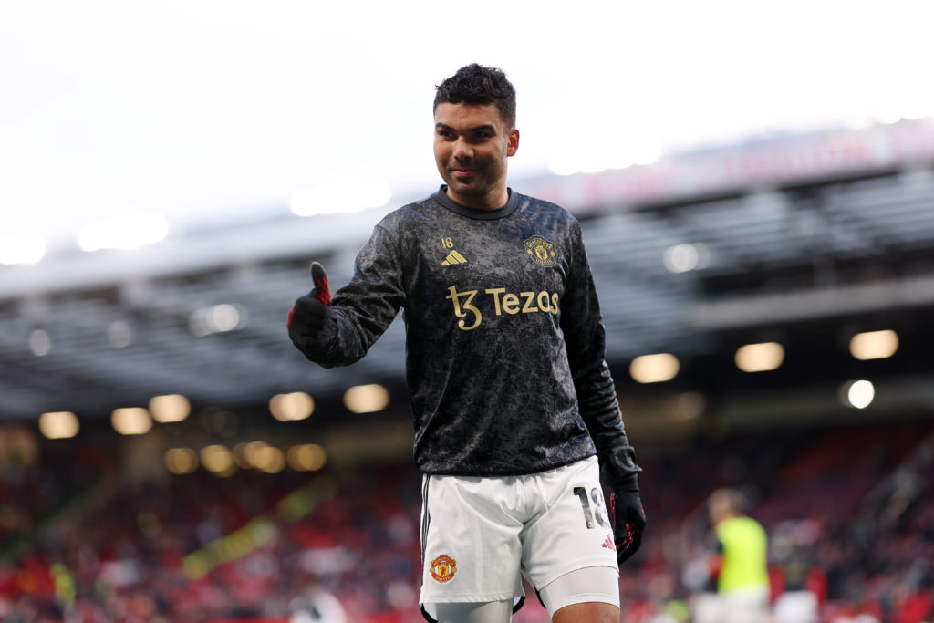 Casemiro of Manchester United gives a thumbs up as he warms up prior to the Premier League match between Manchester United and Sheffield United at ...