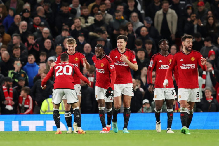 Rasmus Hojlund of Manchester United celebrates scoring his team's fourth goal with Diogo Dalot during the Premier League match between Manchester U...