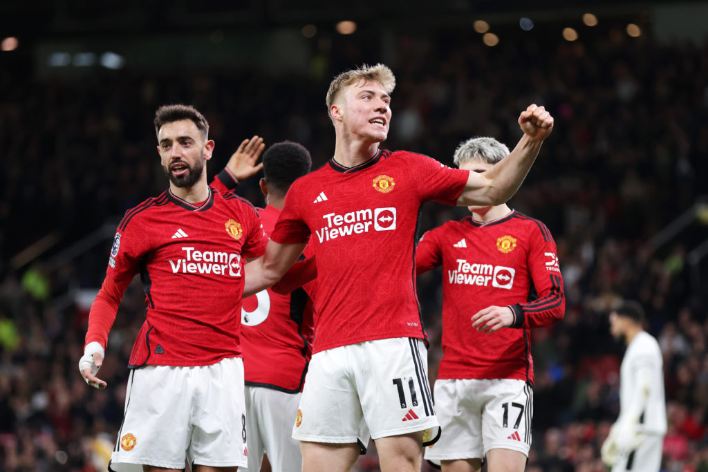 Rasmus Hojlund of Manchester United celebrates scoring his team's fourth goal with Bruno Fernandes during the Premier League match between Manchest...