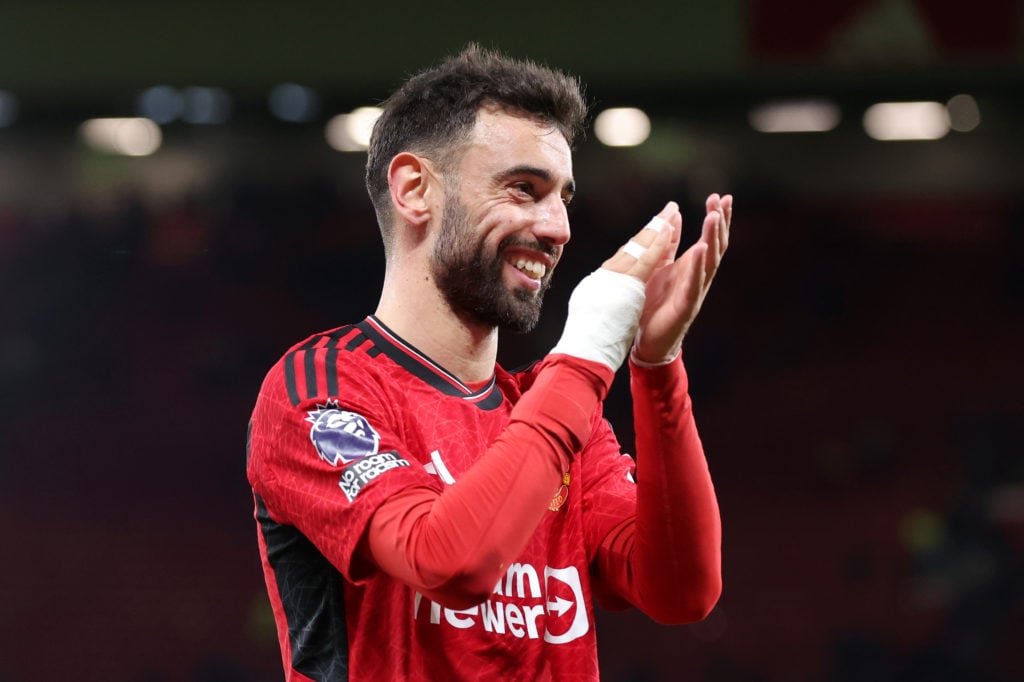 Bruno Fernandes of Manchester United applauds the fans after the team's victory in the Premier League match between Manchester United and Sheffield...