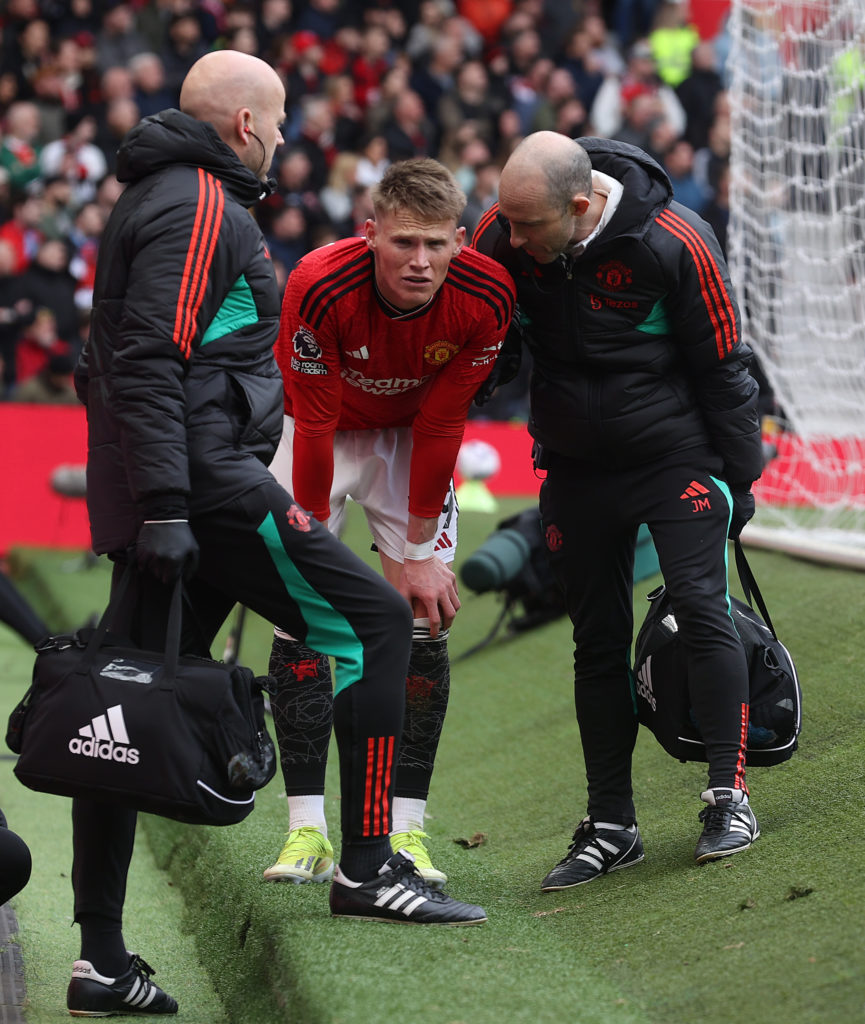 Scott McTominay of Manchester United leaves the match with an injury during the Premier League match between Manchester United and Burnley FC at Ol...