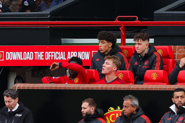 Kobbie Mainoo and Rasmus Hojlund look on after being substituted during the Premier League match between Manchester United and Burnley FC at Old Tr...