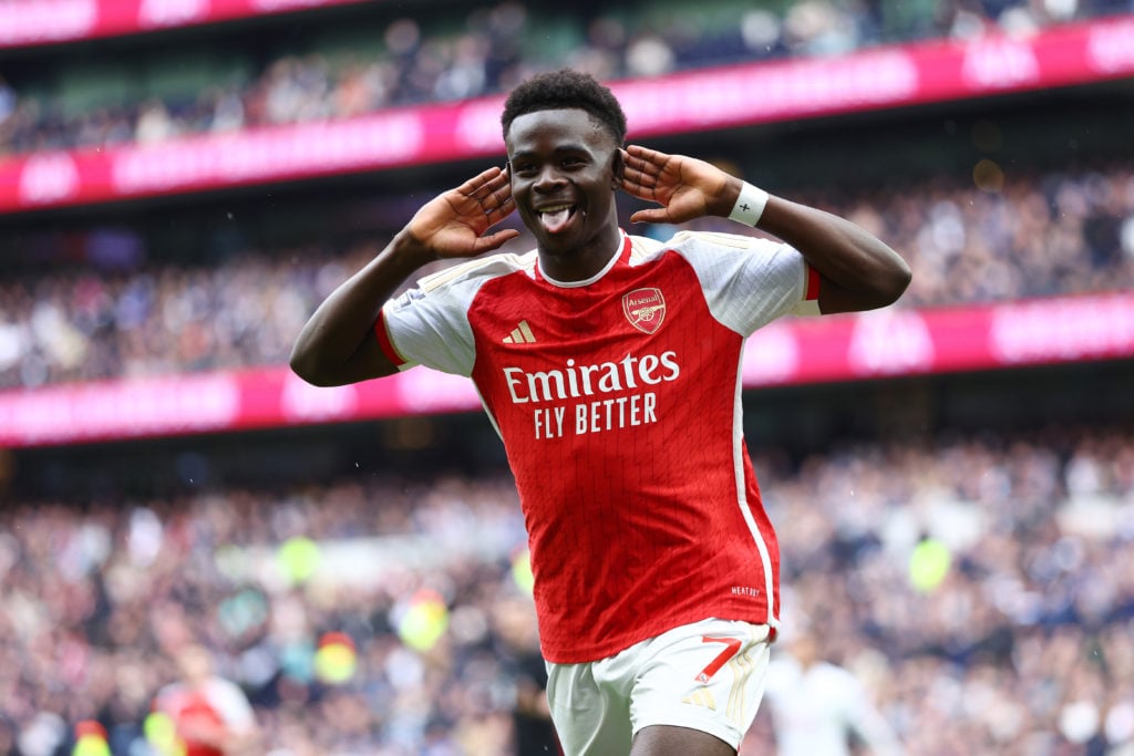 Bukayo Saka of Arsenal celebrates scoring his team's second goal during the Premier League match between Tottenham Hotspur and Arsenal FC at Totten...