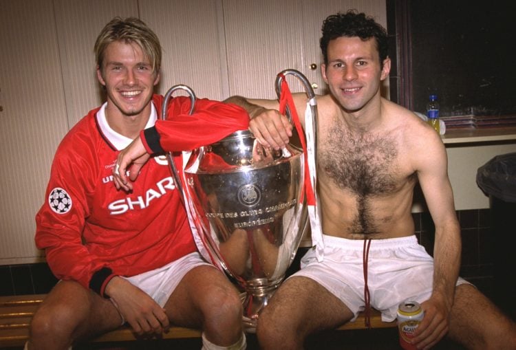 David Beckham and Ryan Giggs celebrate with the European Cup in the dressing room after the UEFA Champions League Final between Bayern Munich v Man...