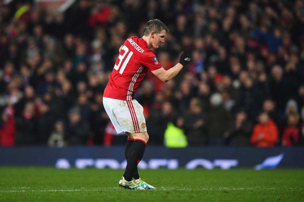 Bastian Schweinsteiger of Manchester United celebrates as he scores their fourth goal during the Emirates FA Cup Fourth round match between Manches...