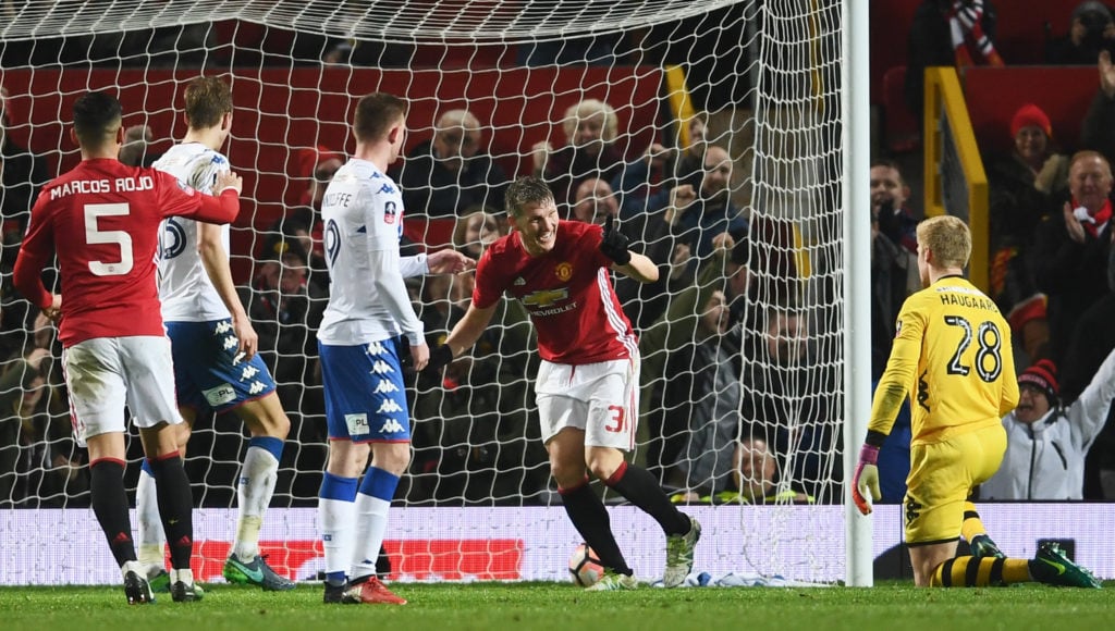 Bastian Schweinsteiger of Manchester United (31) celebrates as he scores their fourth goal during the Emirates FA Cup Fourth round match between Ma...