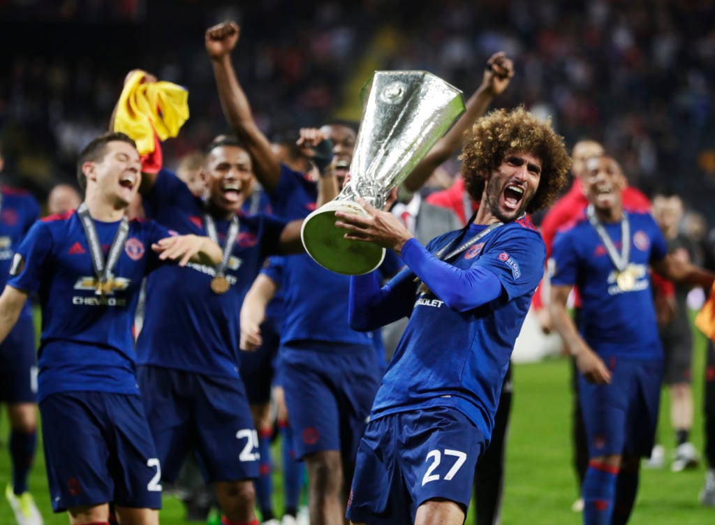 Marouane Fellaini of Manchester United celebrates after the victory with the trophy during the UEFA Europa League Final between Ajax and Manchester...