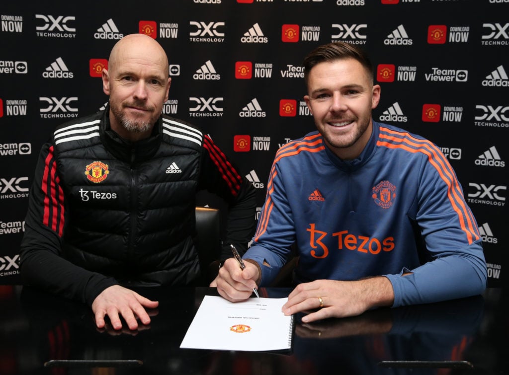 (EXCLUSIVE COVERAGE) Jack Butland of Manchester United poses with Manager Erik ten Hag after signing for the club at Carrington Training Ground on ...